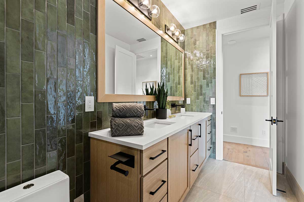 Photo of green jewel tone tile in a luxury bathroom