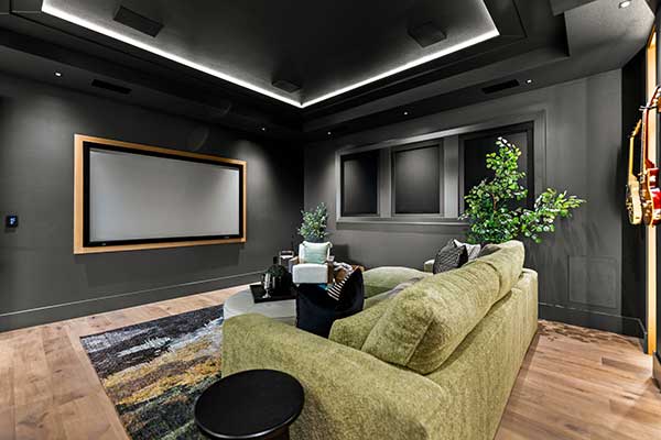 Luxury theater room by Kingston Homes