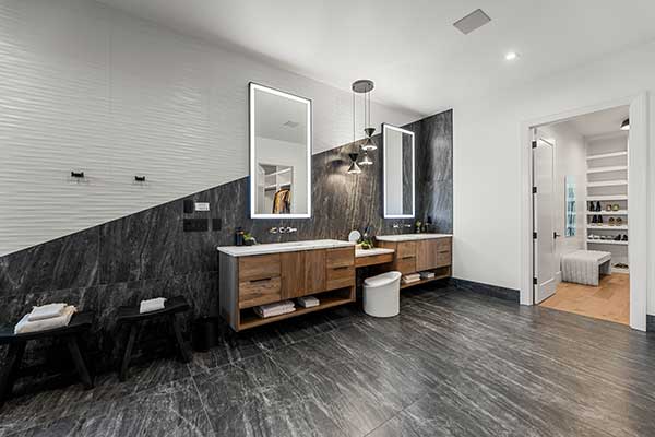 Photo of a luxury bathroom with black and white design