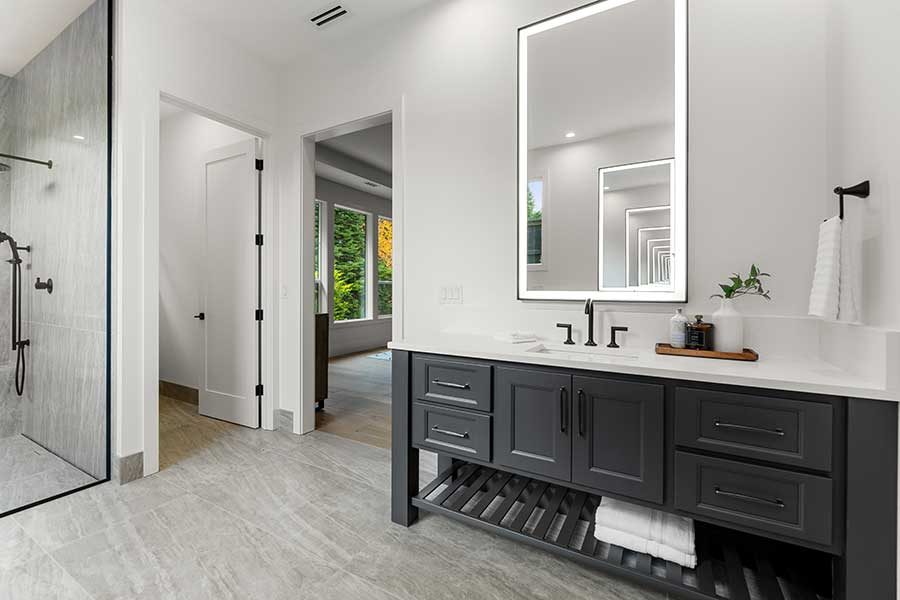 Primary Suite bathroom of modern custom home by Kingston Homes