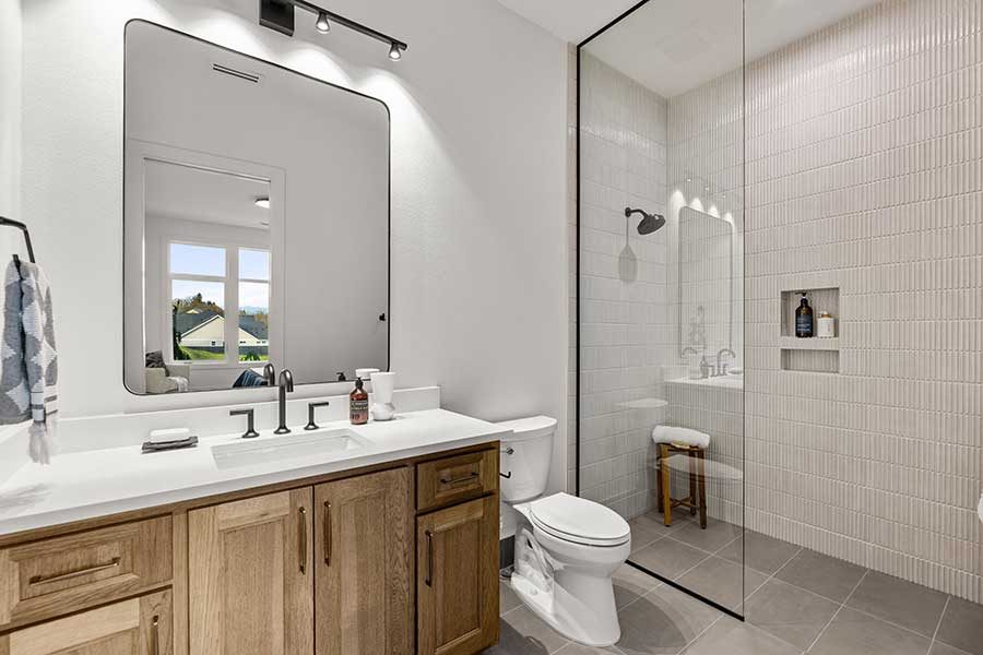 Secondary bathroom of modern custom home by Kingston Homes