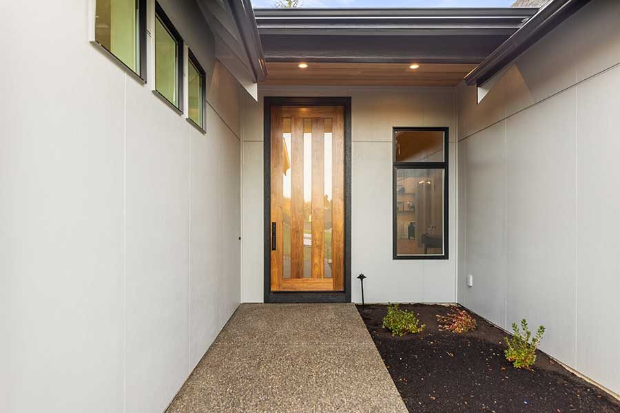 Elegant entrance of modern custom home by Kingston Homes
